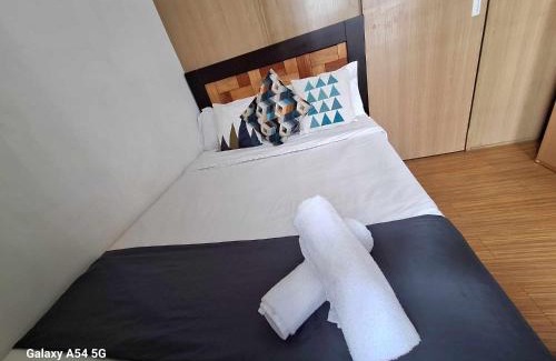 Ususan Apartment | Comfy 1BR with Pool View and Wi-Fi in Grace Res Taguig City