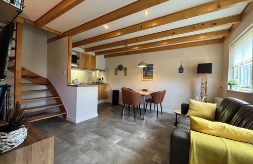 Midsland Apartment | Compact apartment with sunny terrace and extra toilet on bedroom floor.