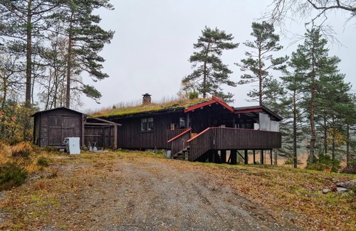 Evje House | Compact cottage on a beautiful plot and sunny location.