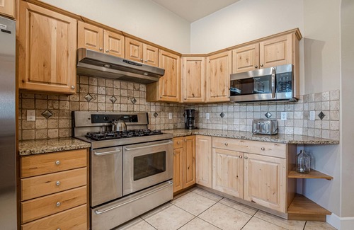Grand Junction House | Compass House: Game Room & Dual Fireplaces