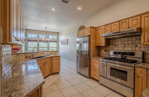 Grand Junction House | Compass House: Game Room & Dual Fireplaces