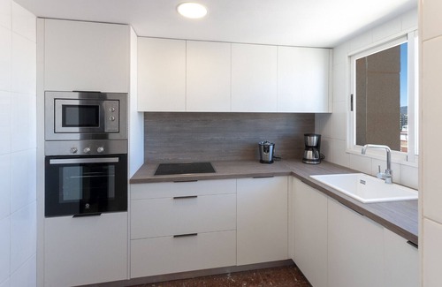 Grao de Gandia Apartment | Condo with charm, a few meters from the beach. A/C and free wifi. Terrace with sea views
