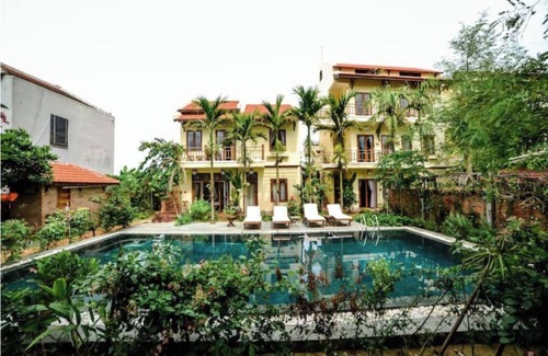 Hoi An Apartment | Connecting room in Upscale Orchid Riverside Oasis.