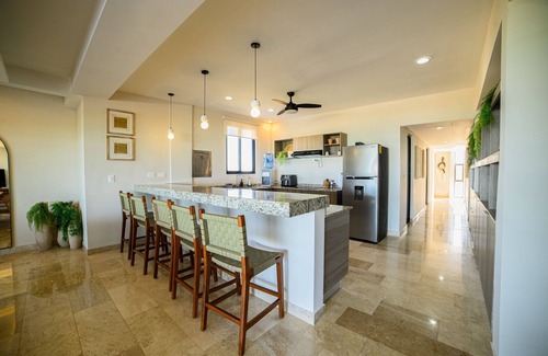 Miramar Apartment | Contemporary beachfront apartment with pool, gym, ocean views, and balcony space