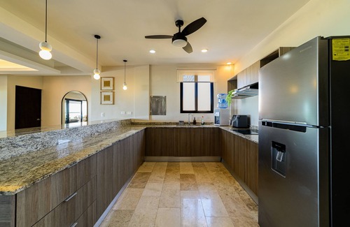 Miramar Apartment | Contemporary beachfront apartment with pool, gym, ocean views, and balcony space