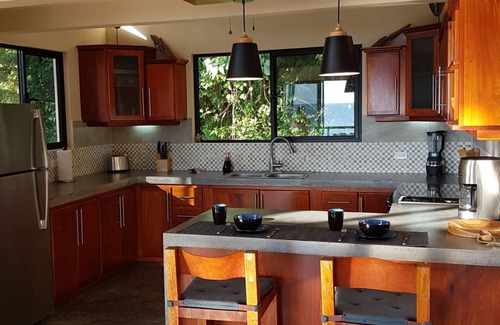 Puerto Carrillo House | Contemporary hillside home overlooking the Pacific Ocean.