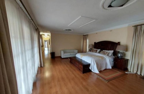 Harare Apartment | Contemporary spacious guesthouse surrounded with green garden and pool in Mount Pleasant - 2063