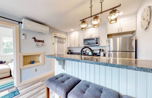 Wells Cottage | Convenient cottage near beach with shared pool, gas grill, W/D, WiFi & AC