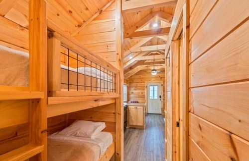 Bryan Cabin | Convenient Stay, Superb Location! Full Kitchen, Outdoor Pool, Pets are Allowed!