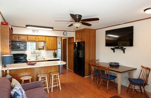 New Braunfels Condo | Cool Waterfront*COMAL*POOL*HTUB - WALK TO DWNTN - TUBES INCL