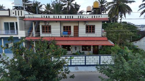 Kushalnagar House | Coorg peacock feathers home stay