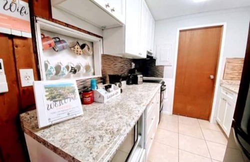 Vacation Village House | Coral Cottage-Pvt lake & pool access Near theme parks w/porch