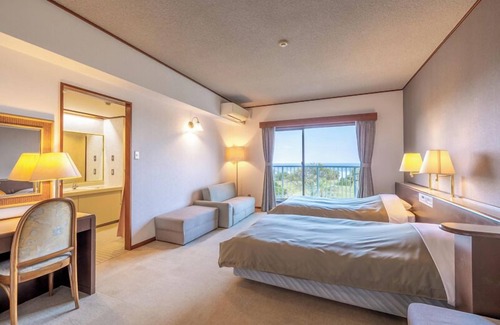 Amami Hotel | Coral Palms