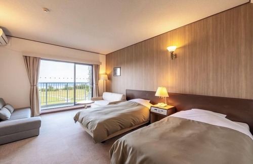 Amami Hotel | Coral Palms