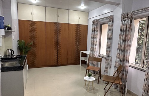 Pune Apartment | Coral : Private Studio near Osho in Koregaon Park. WiFi Smart Tv Kitchenette