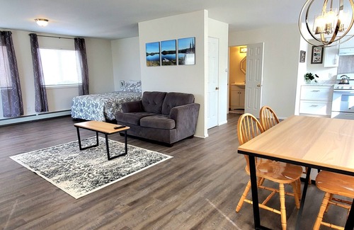 Sand Lake Apartment | Corner studio with full kitchen, 800 sq ft- Sunny views include Mt. Susitna