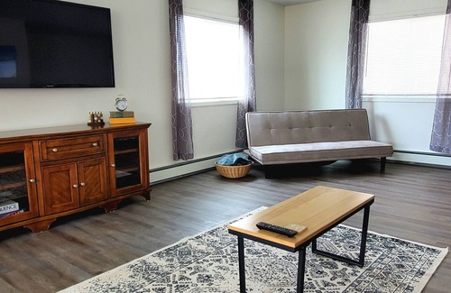 Sand Lake Apartment | Corner studio with full kitchen, 800 sq ft- Sunny views include Mt. Susitna