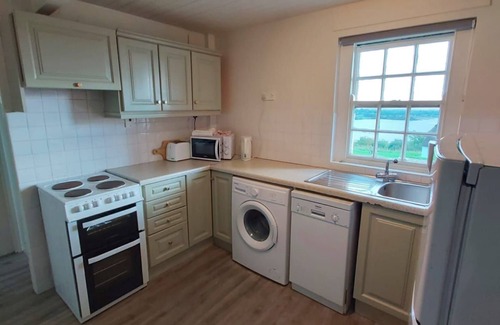 Corofin Cottage | Corofin Lake Cottage No 5 - a two story that sleeps 6 guests in 3 bedrooms