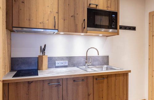 Reith bei Kitzbuehel Apartment | Cosy apartment for 6 guests with WIFI, hot tub, TV, balcony and parking