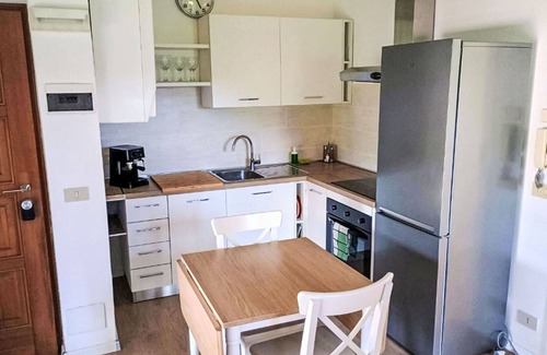 Caldonazzo Apartment | Cosy apartment for 4 guests with A/C, WIFI, TV, patio and parking