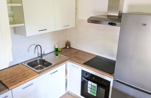 Caldonazzo Apartment | Cosy apartment for 4 guests with A/C, WIFI, TV, patio and parking