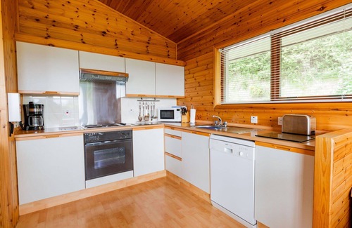 Drumnadrochit House | Cosy apartment in villa for 6 people with WIFI, TV, patio, panoramic view and parking