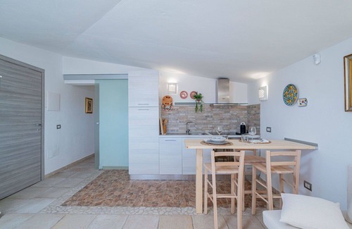 Eden Beach Villa | Cosy apartment in villa for 3 people with WIFI, pool, A/C, TV, patio and parking