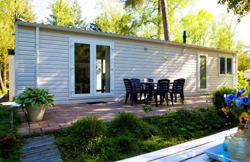 Schaarsbergen House | Cosy apartment in villa for 4 guests with WIFI, pool, TV, terrace and parking