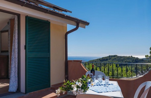 Valloria Apartment | Cosy apartment for 30 people with hot tub, A/C, WIFI, pool, TV, patio and parking