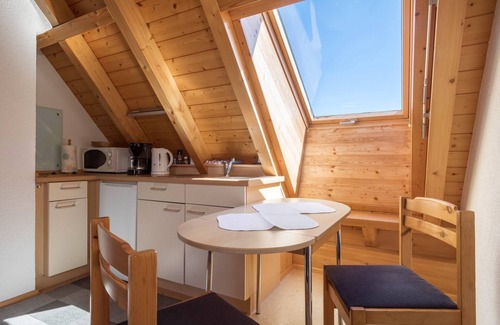Eriskirch Apartment | Cosy Attic Apartment “Haus Sonnenschein” with Wi-Fi, Terrace & Garden