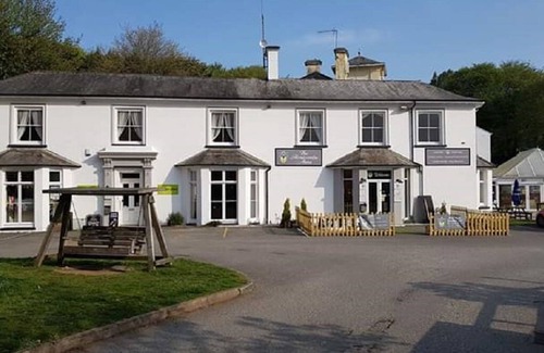 St. Ann's Chapel House | Cosy bungalow in Tamar Valley with shared pools, gym and beautiful scenic views.