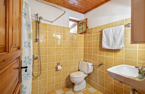 Vasilikos Cottage | Cosy cottage with large veranda and garden with hammock near the beach.