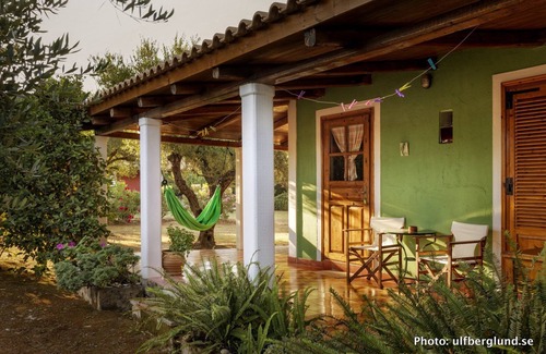 Vasilikos Cottage | Cosy cottage with large veranda and garden with hammock near the beach.