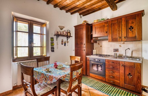 Passignano sul Trasimeno Apartment | Cosy flat equipped with all comforts to comfortably accommodate up to 3 people. The accommodation is located in a renovated former oil mill, which offers its guests numerous shared facilities: access to the seasonal swimming pool, green area with barbecu