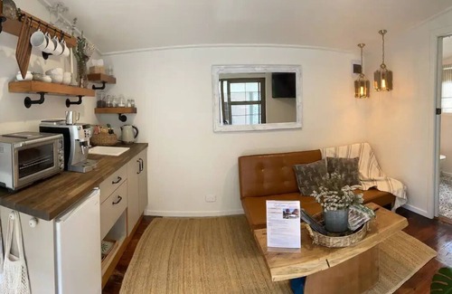 Wanganui District House | Cosy guest sleep out with sauna on dairy farm