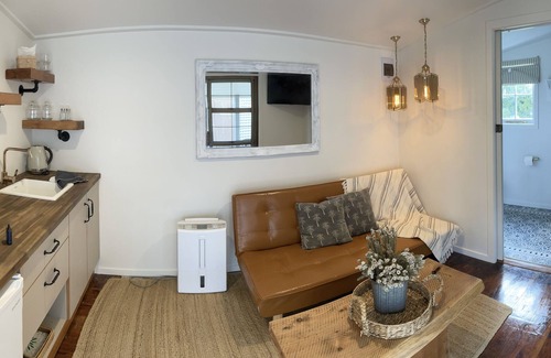 Wanganui District House | Cosy guest sleep out with sauna on dairy farm