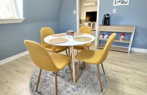 Yarmouth Apartment | Cosy, quiet butterscotch apartment on Doane with hot tub