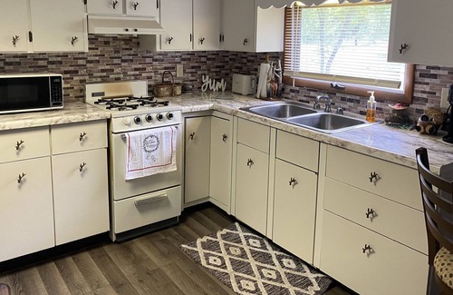 Bitely Cottage | Cottage on the creek. Inflatable Hot Tub, kayak, enjoy a fire or play games!