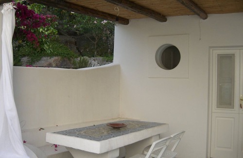Aeolian Islands Apartment | Cottage with large garden in the center of Panarea