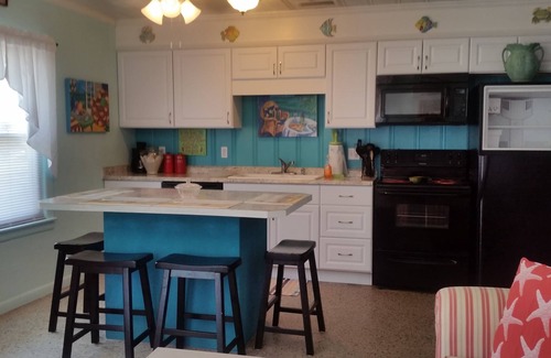 Kiska Beach Cottage | Country charm location on the Beautiful, quiet West End. Pet friendly and cozy!