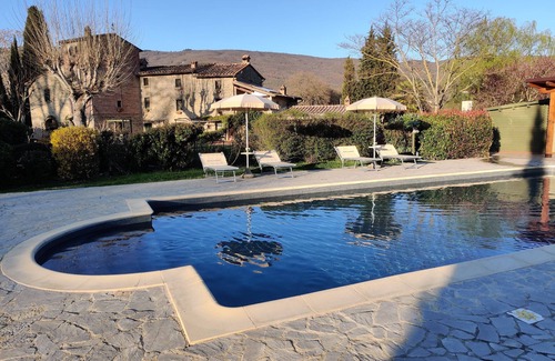 Piazzano Apartment | Country tower apartment in Cortona 1bed1bath with shared pool & gorgeous gardens