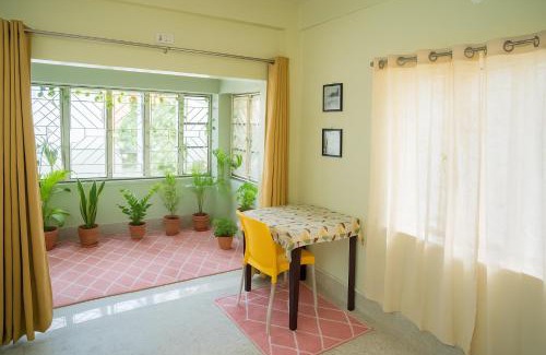 Tollygunge House | couple friendly room with balcony, kitchen private bath