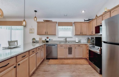 Duval House | Courtyard Villa in the Heart of The Villages