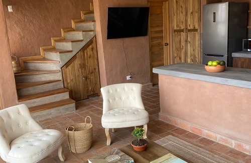 Huayllabamba Ski Chalet | Cozi house with fireplace overlooking the Sacred Valley of the Incas
