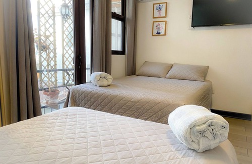 Zona 12 Hotel | Cozy 1-bedroom for families at Inn. WiFi and AC. In Guatemala. Close airport.