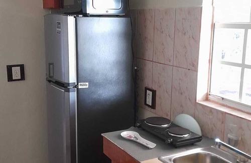 Willemstad House | Cozy 2-bedroom apartment in wonderful Willemstead with WiFi, AC, fitness room