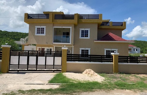 Windsor Apartment | Cozy 2-bedroom apartment in peaceful Trelawny Parish with AC, walking to Beach