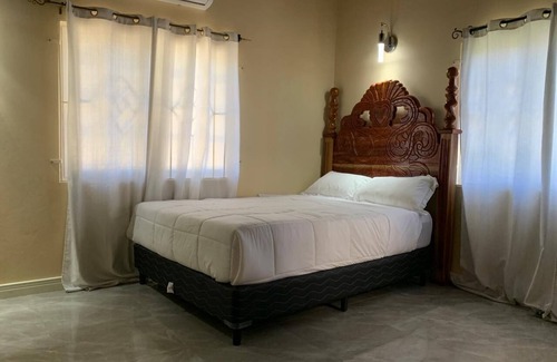 Windsor Apartment | Cozy 2-bedroom apartment in peaceful Trelawny Parish with AC, walking to Beach