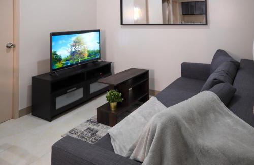 New Manila Apartment | Cozy 2BR Condo with Parking