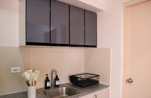 New Manila Apartment | Cozy 2BR Condo with Parking